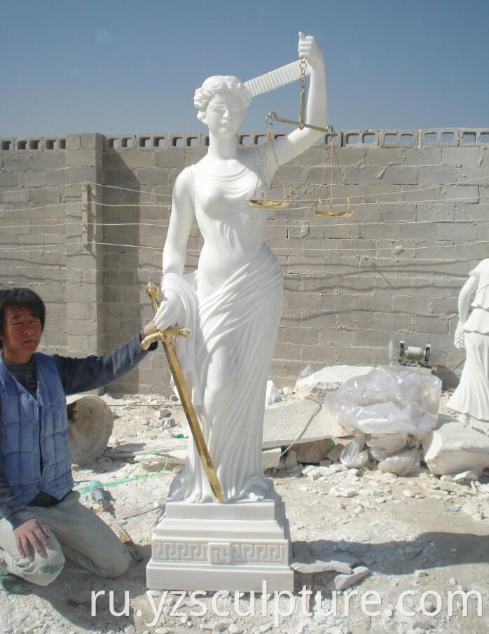 white marble religious statue